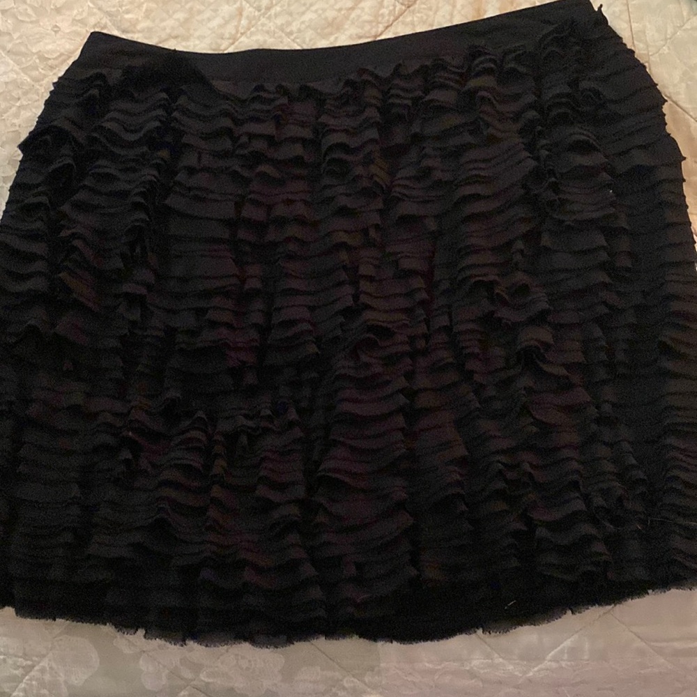Frilly, layered black skirt